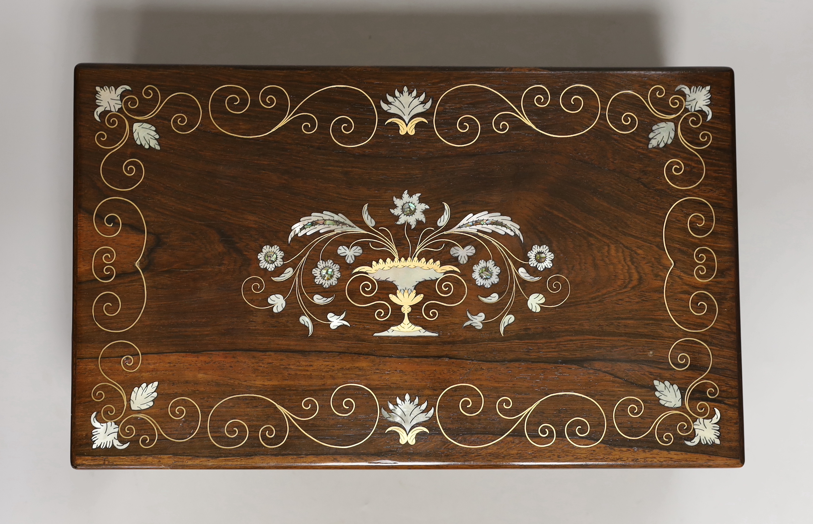 A 19th century brass and mother of pearl inlaid rosewood writing slope, 40cm wide